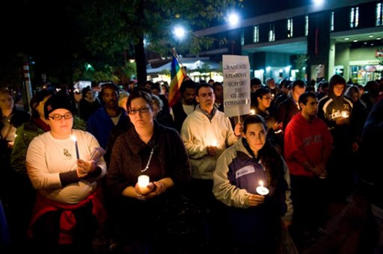 People participate in a candlelight vigil for Rutgers University freshman Tyler Clementi at Brower Commons on the Rutgers campus in New Brunswick, N.J., on Sunday.